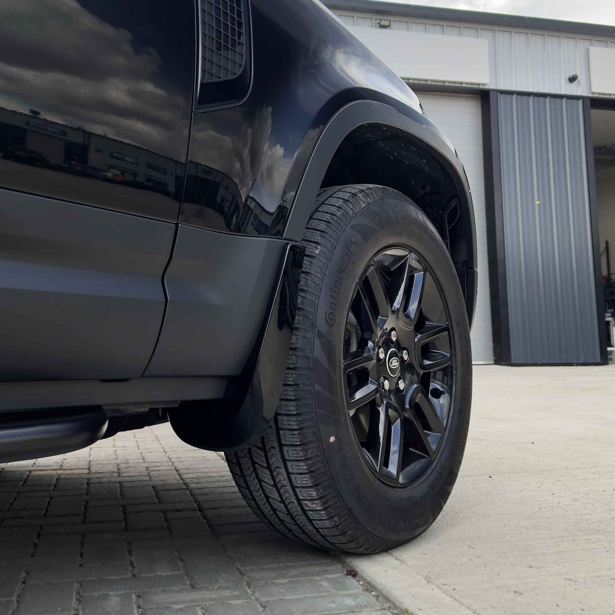 LAND ROVER DEFENDER L663 110 & 90 GLOSS BLACK MUD FLAPS